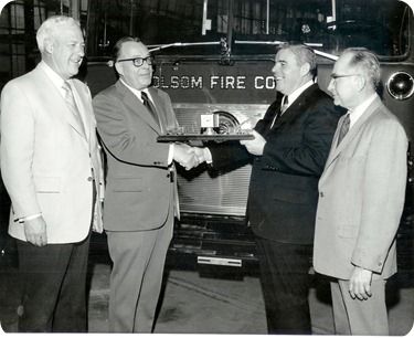John Mac receiving an achievement for best salesman