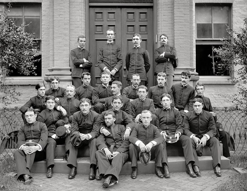 Yates Stirling Jr. (seated, upper left) with members of USNA Class of 1892